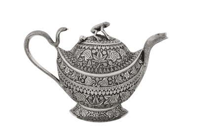 Lot 95 - A late 19th century Anglo – Indian unmarked silver teapot, Kashmir circa 1880