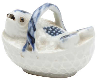 Lot 480 - A JAPANESE HIRADO BLUE AND WHITE 'FISH' WATER DROPPER