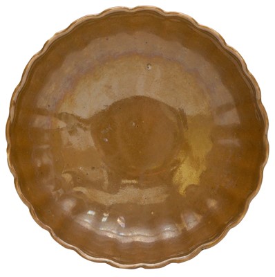 Lot 510 - A CHINESE CAFÉ AU LAIT-GLAZED FOLIATE SAUCER