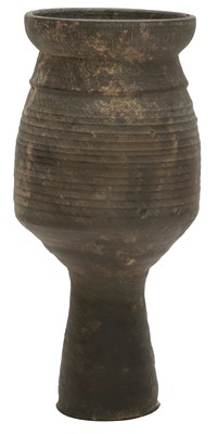 Lot 650 - A NEOLITHIC BLACK POTTERY STEM CUP