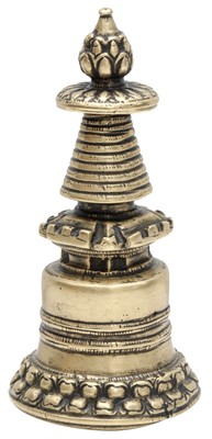 Lot 659 - A TIBETAN BRONZE MODEL OF A STUPA