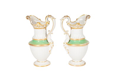 Lot 116 - A PAIR OF ENGLISH SOFT PASTE PORCELAIN EWERS, EARLY 19TH CENTURY