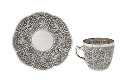Lot 201 - An early 20th century Ceylonese (Sri Lankan) unmarked silver cup and saucer, Kandy circa 1920
