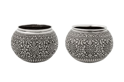 Lot 196 - A pair of late 19th / 20th century Ceylonese (Sri Lankan) unmarked silver small bowls, Kandy or Colombo circa 1900