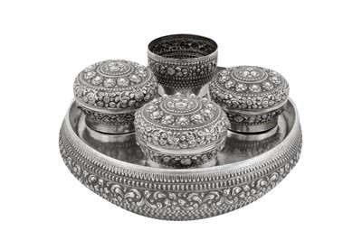 Lot 214 - A large mid - 20th century Thai silver betel nut set, dated 1953
