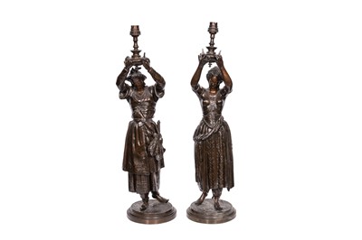 Lot 214 - A PAIR OF BRONZED FIGURAL TABLE LAMPS, EARLY 20TH CENTURY
