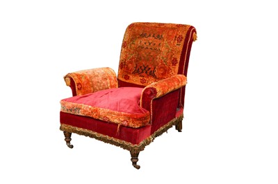 Lot 191 - A LATE 19TH CENTURY UPHOLSTERED ARMCHAIR WITH CARPET FABRIC COVERS
