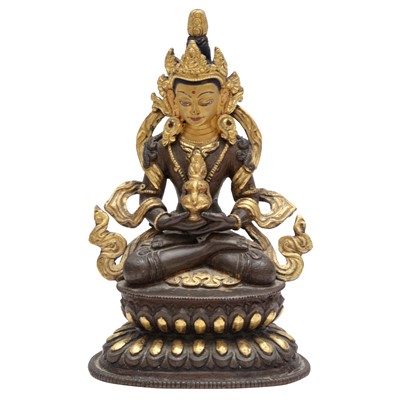 Lot 148 - A Sino-Tibetan parcel-gilt bronze figure of Amitayus, Qing dynasty, 18th century