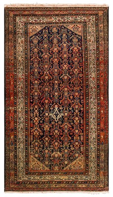 Lot 14 - AN ANTIQUE NORTH-WEST PERSIAN RUG