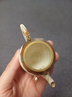 Lot 455 - A SMALL JAPANESE SATSUMA TEAPOT AND COVER BY YABU MEIZAN