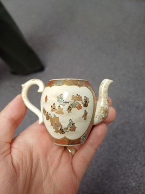 Lot 455 - A SMALL JAPANESE SATSUMA TEAPOT AND COVER BY YABU MEIZAN