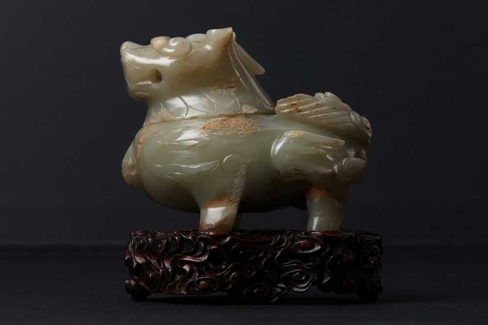 75 - A CHINESE CARVED CELADON JADE 'MYTHICAL BEAST' CENSER