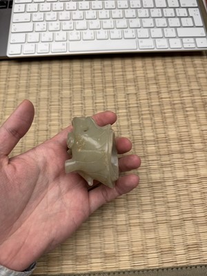 Lot 75 - A CHINESE CARVED CELADON JADE 'MYTHICAL BEAST' CENSER