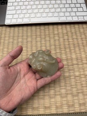 Lot 75 - A CHINESE CARVED CELADON JADE 'MYTHICAL BEAST' CENSER
