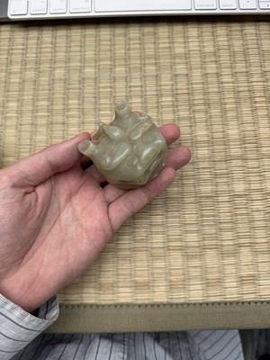 Lot 75 - A CHINESE CARVED CELADON JADE 'MYTHICAL BEAST' CENSER