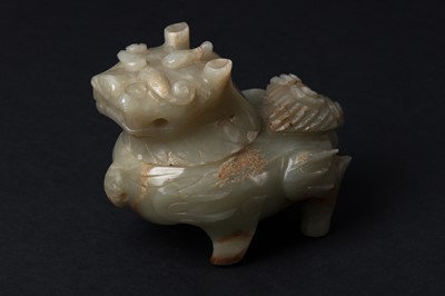 Lot 75 - A CHINESE CARVED CELADON JADE 'MYTHICAL BEAST' CENSER