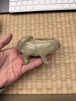 Lot 75 - A CHINESE CARVED CELADON JADE 'MYTHICAL BEAST' CENSER