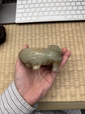 Lot 75 - A CHINESE CARVED CELADON JADE 'MYTHICAL BEAST' CENSER