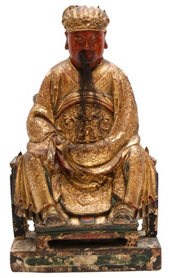 Lot 861 - A CHINESE LACQUERED AND GILT WOOD FIGURE OF AN OFFICIAL