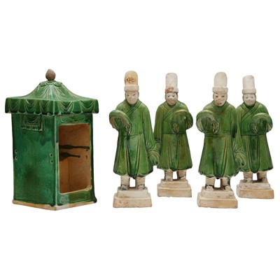 Lot 278 - Four Chinese green-glazed figures with a sedan, Ming dynasty