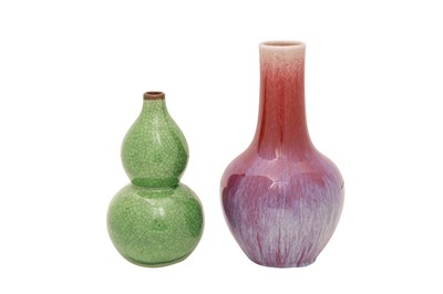 Lot 51 - A CHINESE FLAMBE-GLAZED VASE AND AN APPLE-GREEN VASE