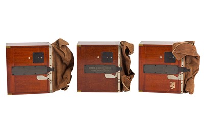 Lot 67 - Three Newman & Guardia polished Mahogany Film Magazines