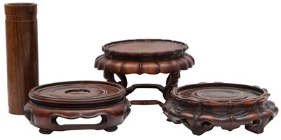 Lot 803 - A GROUP OF THREE CARVED WOOD STANDS AND A BRUSH POT