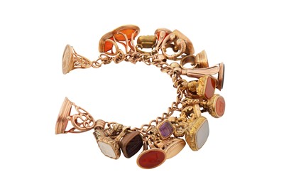 Lot 18 - A GEM-SET CHARM BRACELET