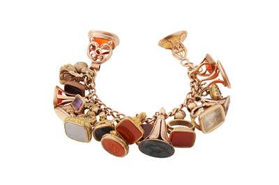 Lot 18 - A GEM-SET CHARM BRACELET