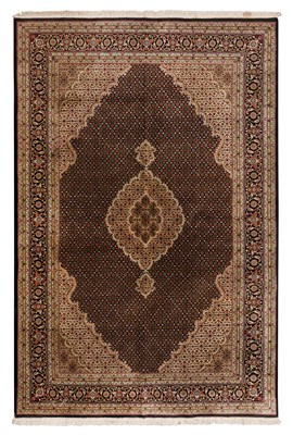 Lot 71 - A FINE INDO-TABRIZ CARPET