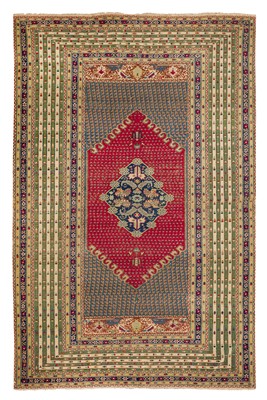 Lot 58 - AN ANTIQUE GHIORDES RUG, TURKEY