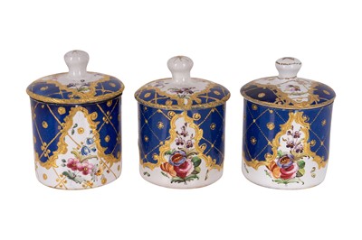 Lot 116 - A set of three 18th-century Bilston or South Staffordshire enamel covered pomade pots