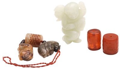 Lot 610 - A GROUP OF CHINESE JADE CARVINGS AND AMBER BEADS