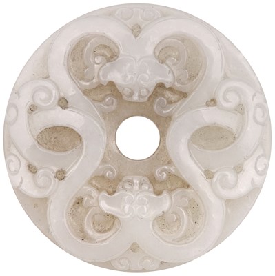 Lot 614 - A CHINESE CARVED CELADON JADE 'CHILONG' ROUND PLAQUE
