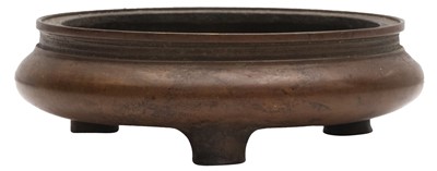 Lot 667 - A CHINESE BRONZE TRIPOD CENSER