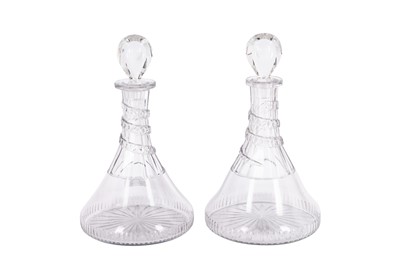 Lot 127 - A PAIR OF REGENCY GLASS SHIP'S DECANTERS