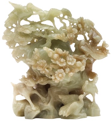 Lot 620 - A CHINESE CELADON JADE 'BIRDS AND BLOSSOMS' CARVING