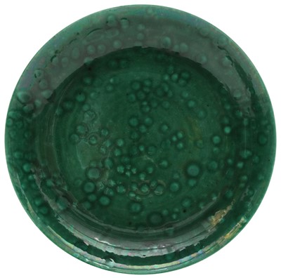 Lot 210 - AN UNUSUAL CHINESE MONOCHROME GREEN-GLAZED DISH