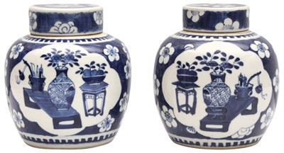 Lot 821 - A PAIR OF CHINESE BLUE AND WHITE JARS AND COVER