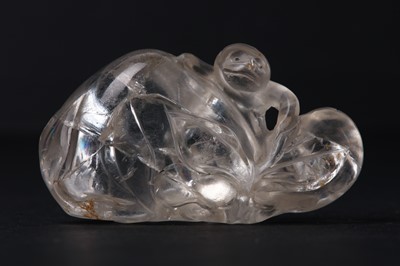 Lot 88 - A CHINESE CARVED ROCK CRYSTAL 'MONKEY AND PEACH' GROUP