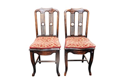 Lot 285 - A pair of Chinese wood chairs, early 20th century