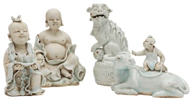Lot 782 - FOUR CHINESE QINGBAI-GLAZED BISCUIT FIGURES