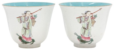 Lot 225 - A PAIR OF CHINESE FAMILLE-ROSE SGRAFFIATO-GROUND 'MAGU' CUPS