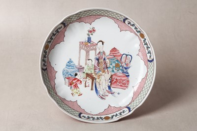 Lot 261 - A CHINESE FAMILLE-ROSE RUBY-BACK 'LADY AND CHILDREN' DISH