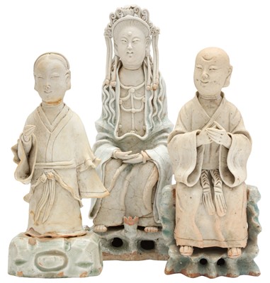 Lot 783 - THREE CHINESE QINGBAI-GLAZED BISCUIT FIGURES
