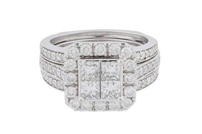 Lot 227 - A diamond cluster bridal ring set