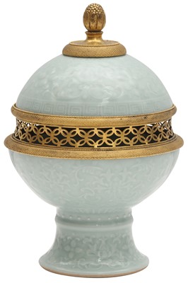 Lot 212 - A CHINESE CELADON STEM CUP AND COVER WITH GILT-MOUNTS
