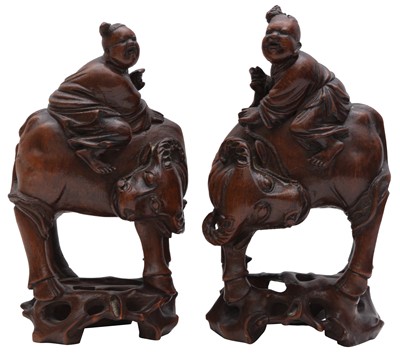 Lot 870 - A PAIR OF CHINESE CARVED BAMBOO 'BOY RIDING WATER BUFFALO' FIGURES