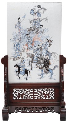 Lot 950 - A CHINESE BLUE AND WHITE AND COPPER-RED 'EIGHT IMMORTALS' PLAQUE WITH WOOD STAND
