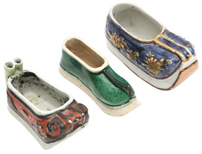 Lot 387 - THREE CHINESE FAMILLE-VERTE BISCUIT SHOES